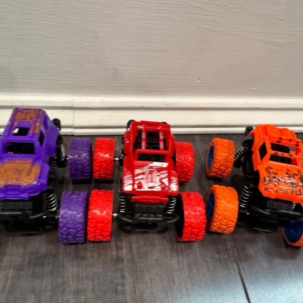 NWOT Monster Truck Toy Set - Green, Purple, Red, and Orange Kids Boys- 4 Cars
